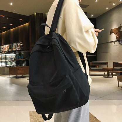 Durable Water-Resistant Canvas Laptop Backpack with Multiple Compartments for School and Everyday Use 4